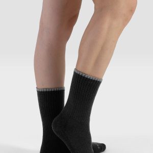 Side profile of CLOSEMATE black unisex soccer mid-calf sock highlighting ribbed knit and toe logo