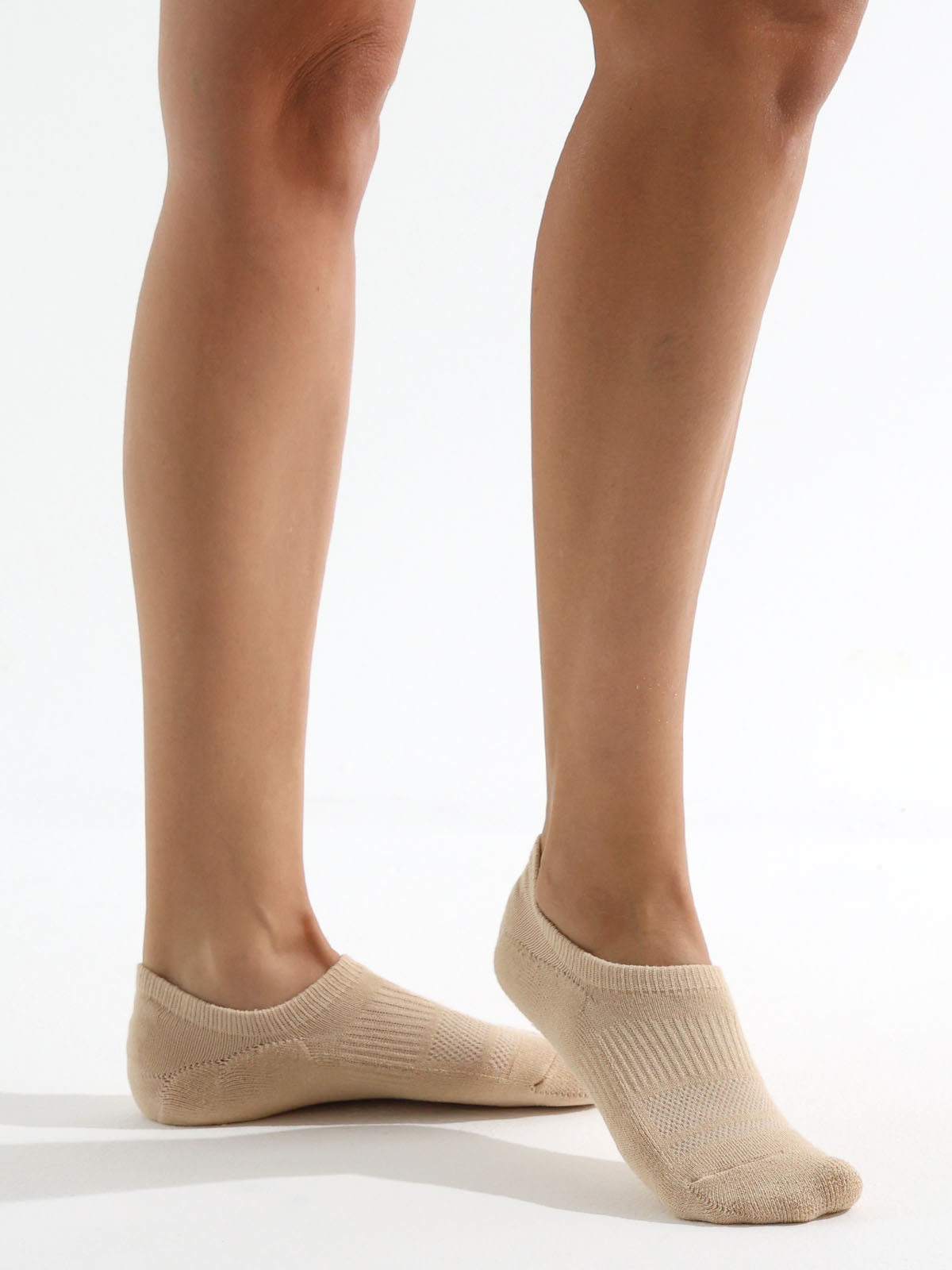 Khaki no-show sock with ribbed arch support displayed on a light background.