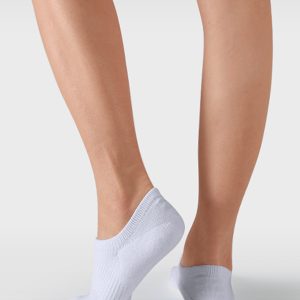White no-show sock with ribbed arch support displayed on a light background.